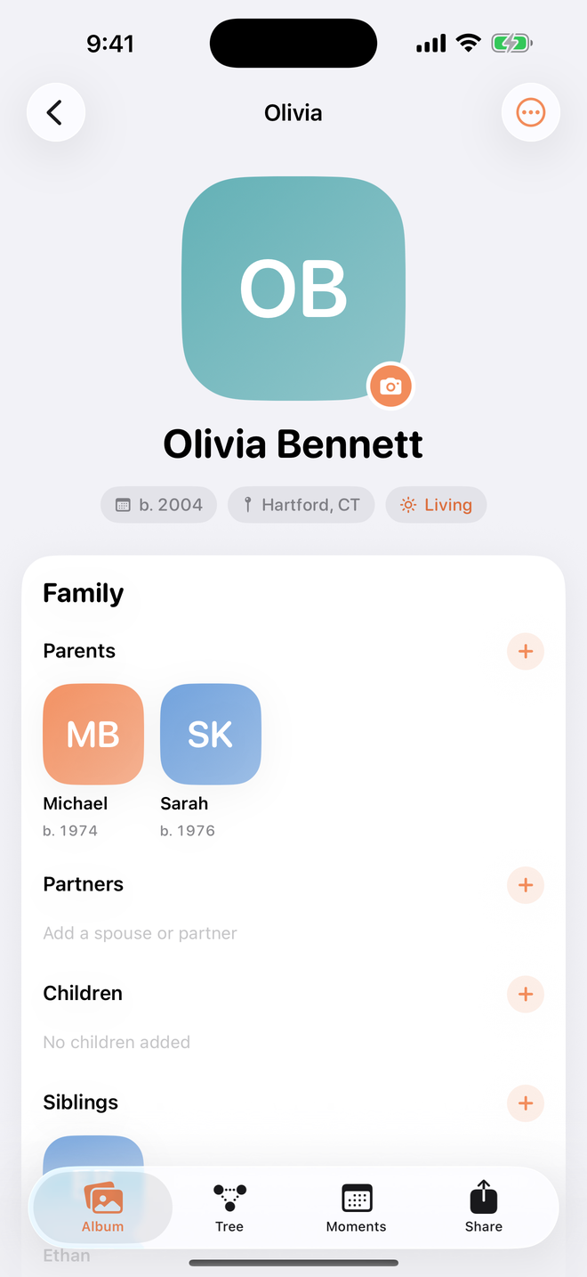 A person page with a large portrait, life events and family rows